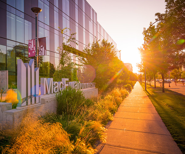 exterior of allard hall at sunrise