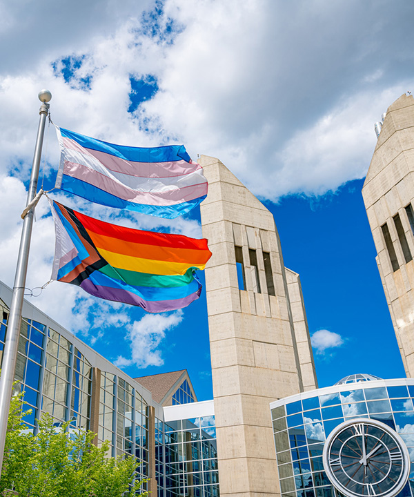 macewan pride flag in front of building