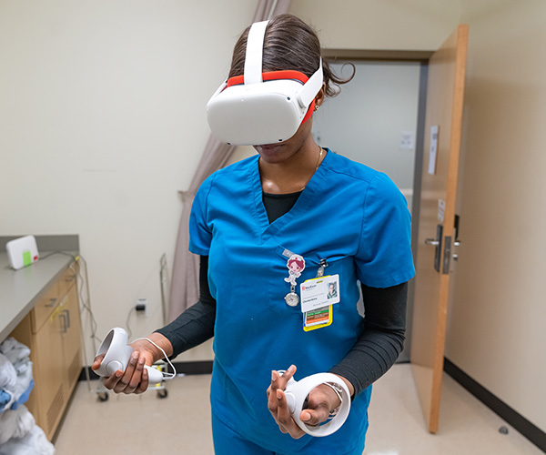 female student doing virtual reality